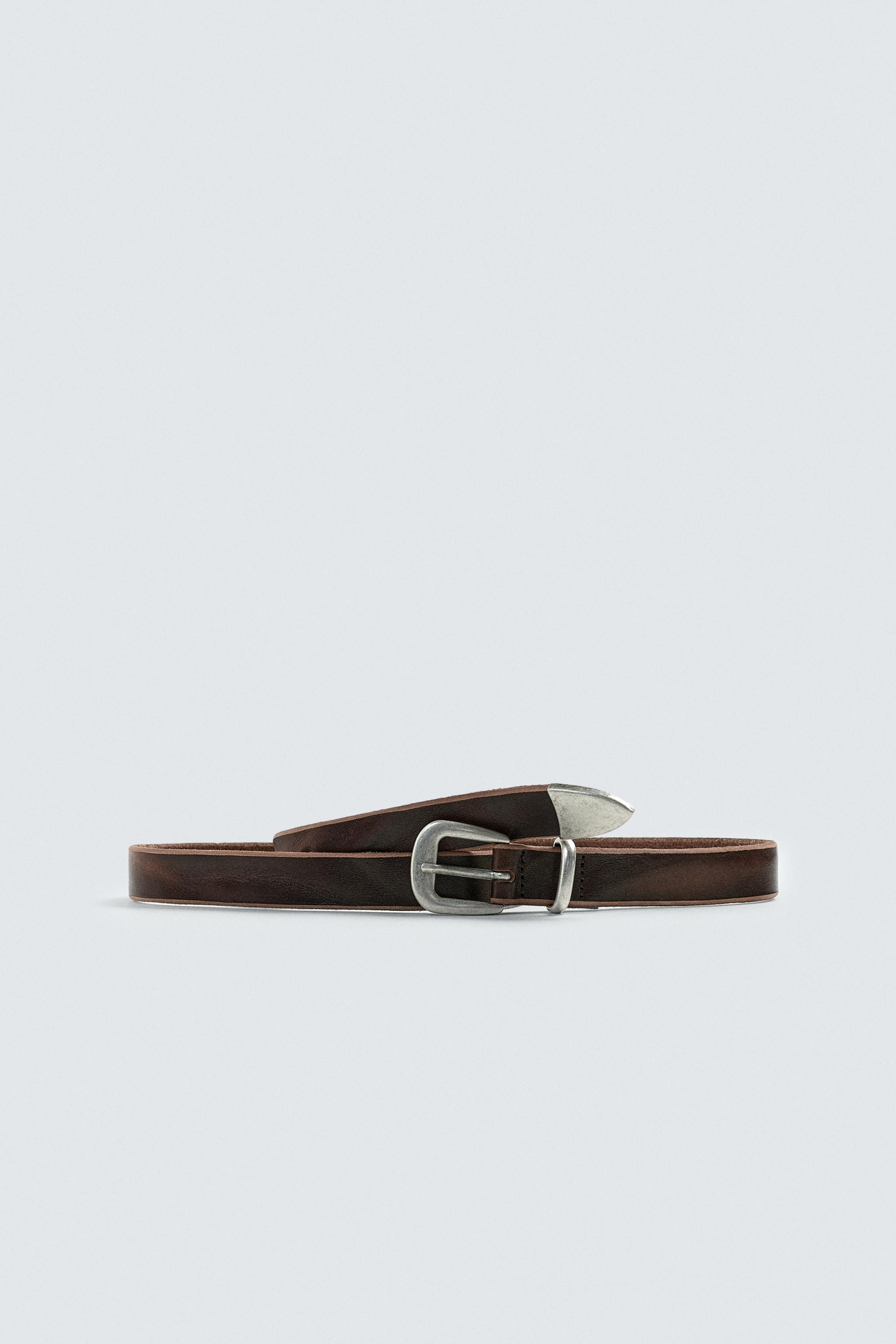 CEINTURE EN CUIR AVEC BOUT MÉTALLIQUE